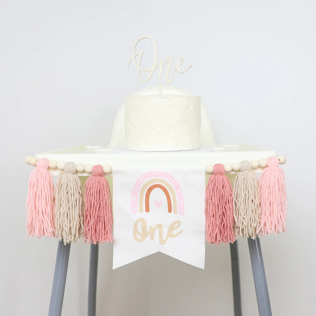 Rainbow 1st Birthday High Chair Banner, Textile Bead and Tassel Garland, Modern Party Decoration in Pink - product view 3