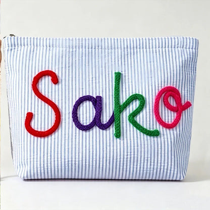 Personalized Seersucker Toiletry Bag, Chenille Name Embroidery, Reusable Rectangular Travel Makeup Pouch in Multiple Colors - product view 1