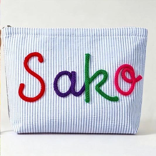 Personalized Seersucker Toiletry Bag, Chenille Name Embroidery, Reusable Rectangular Travel Makeup Pouch in Multiple Colors - product view 1
