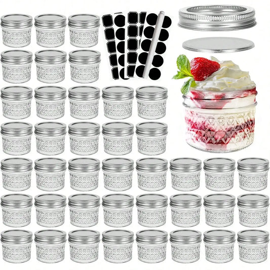 24-Piece Mini Glass Mason Jar Set, 4 oz Clear Jars with Silver Split Lids, Labels and Pen for Storage or Favors - product view 1